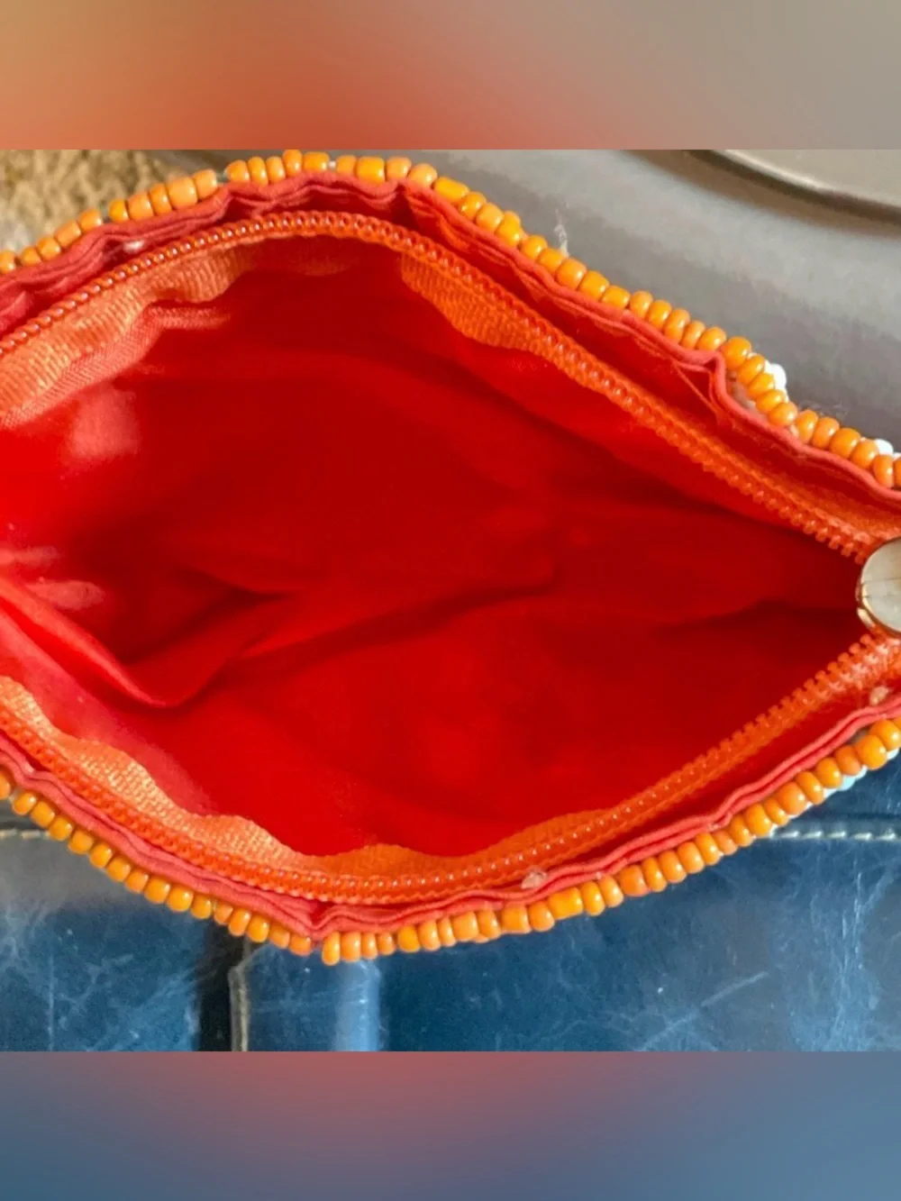 Small hand beaded clutch